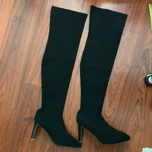 Black heeled boots (over the knee)